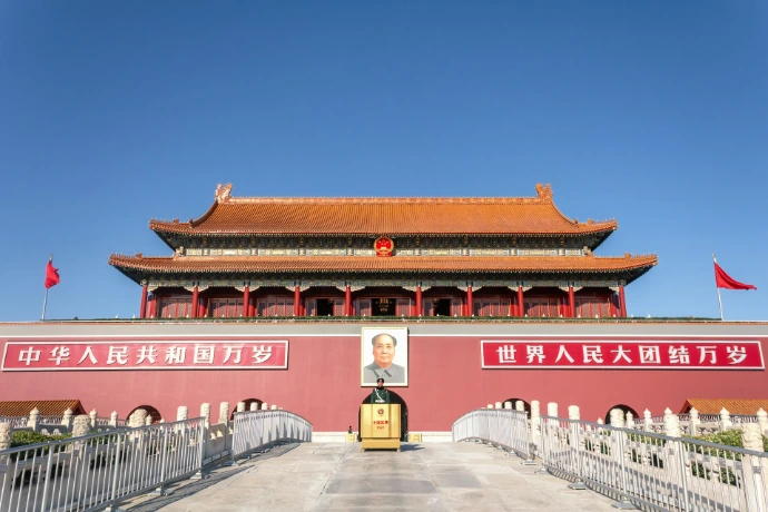 A large building with a gate in front of it